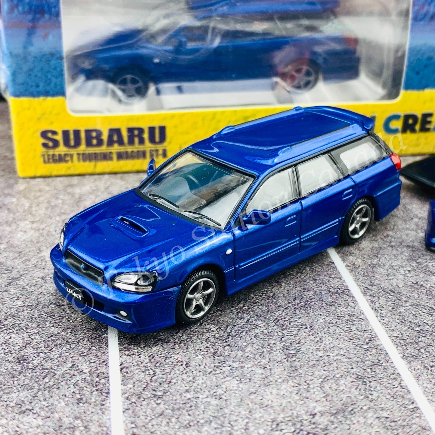 BM Creations JUNIOR 1/64 Subaru 2002 Legacy E-tune II BLUE RHD with Extra Wheels, Lowering Parts 64B0150