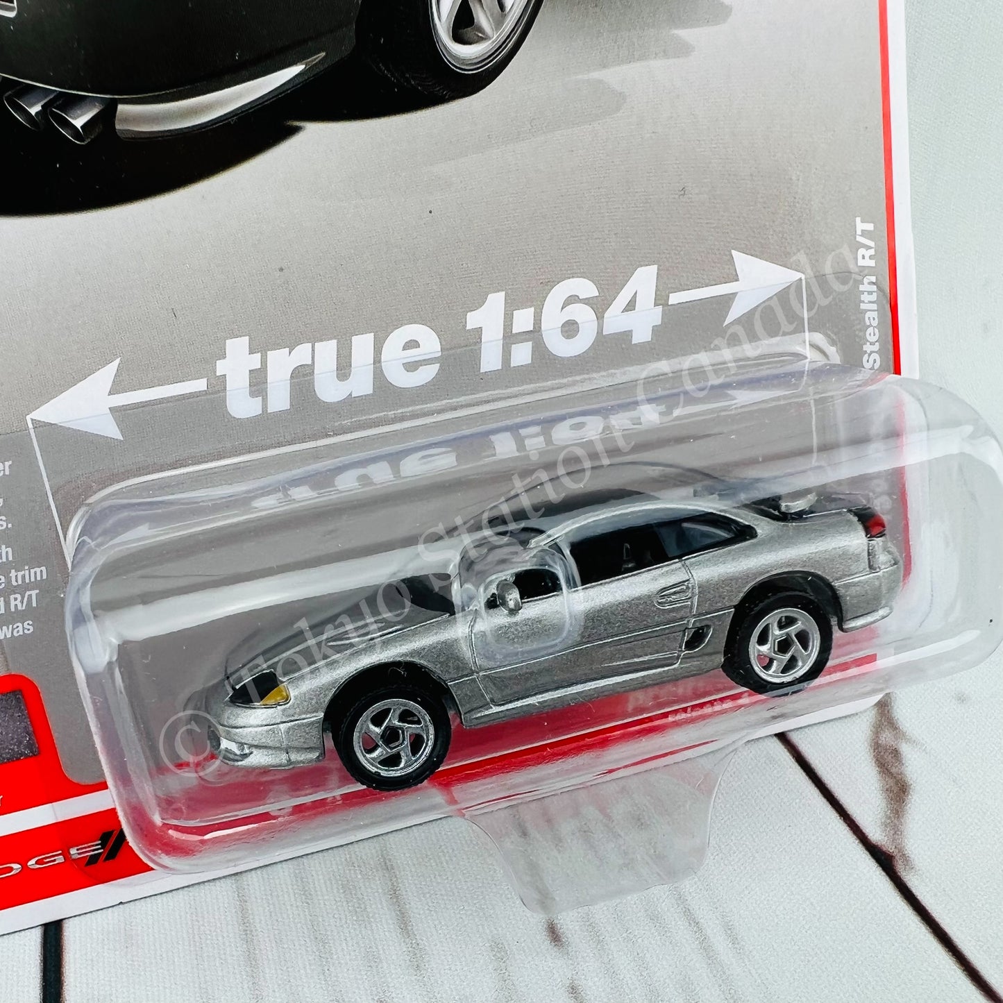 AUTO WORLD 1/64 1993 Dogde Stealth R/T Dark Silver 849398049327