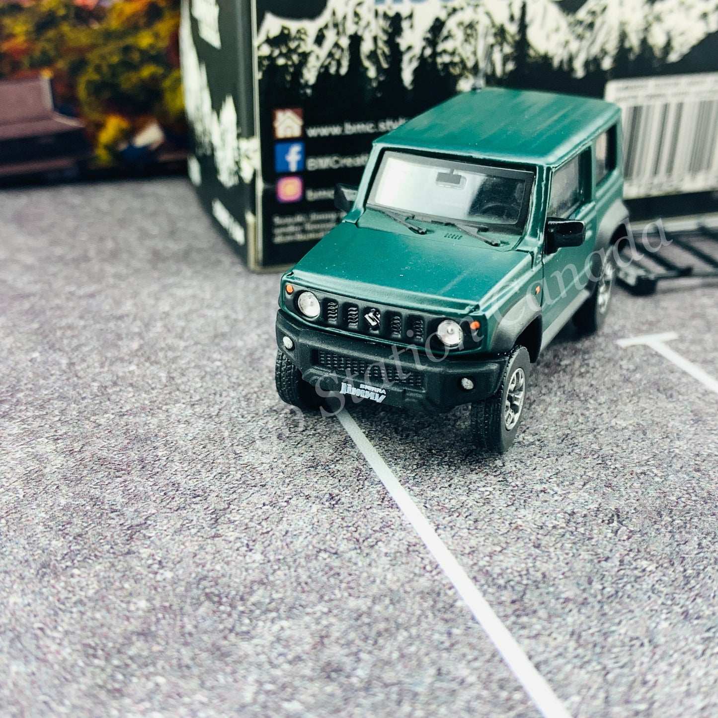 BM CREATIONS JUNIOR 1/64 Suzuki Jimny SIERRA JB74 with Accessory Pack Matt Green LHD 64B0033