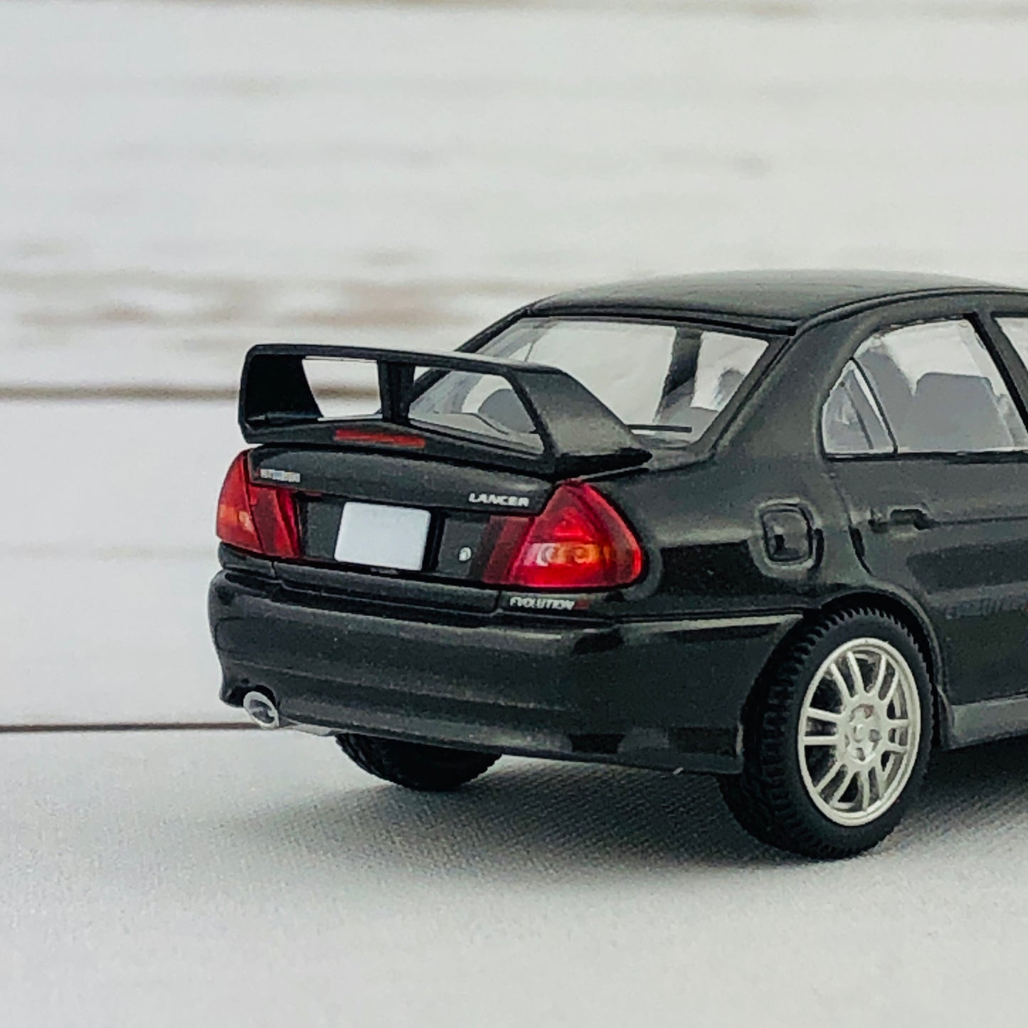 Tomica Limited Vintage Neo Mitsubishi Lancer Evolution IV GSR Black (1996) LV-N186b