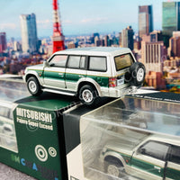 BM CREATIONS JUNIOR 1/64 Mitsubishi Pajero Super Exceed Silver with Green Stripe LHD 64B0020