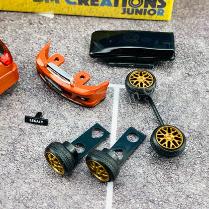 BM Creations JUNIOR 1/64Subaru 2002 Legacy E-tune II ORANGE RHD with Extra Wheels, Lowering Parts 64B0152