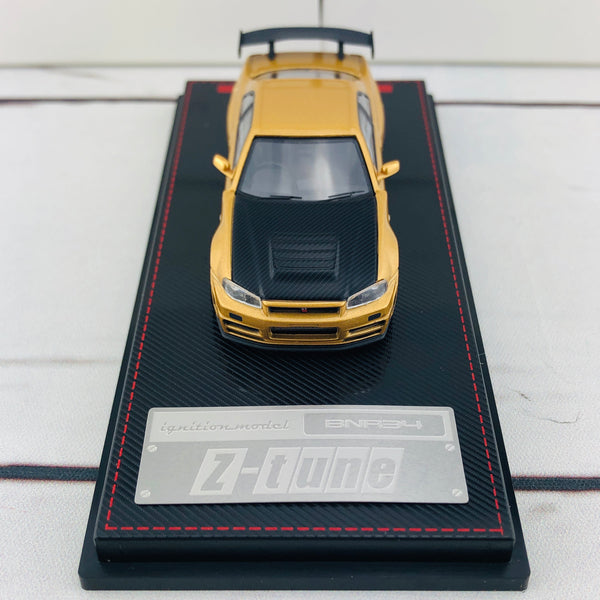 Ignition Model 1/64 Nismo R34 GTR Z-tune Gold 1875 – Tokyo Station