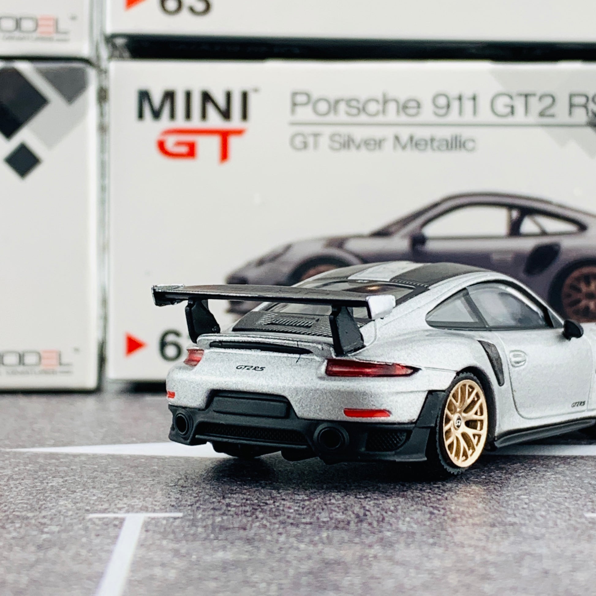 MINI GT 1/64 Porsche 911 Turbo GT2 RS GT Weissach Package Silver Metallic RHD MGT00063-R