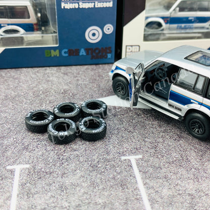 BM CREATIONS JUNIOR 1/64 Mitsubishi Pajero Super Exceed Silver with Blue Stripe LHD 64B0037