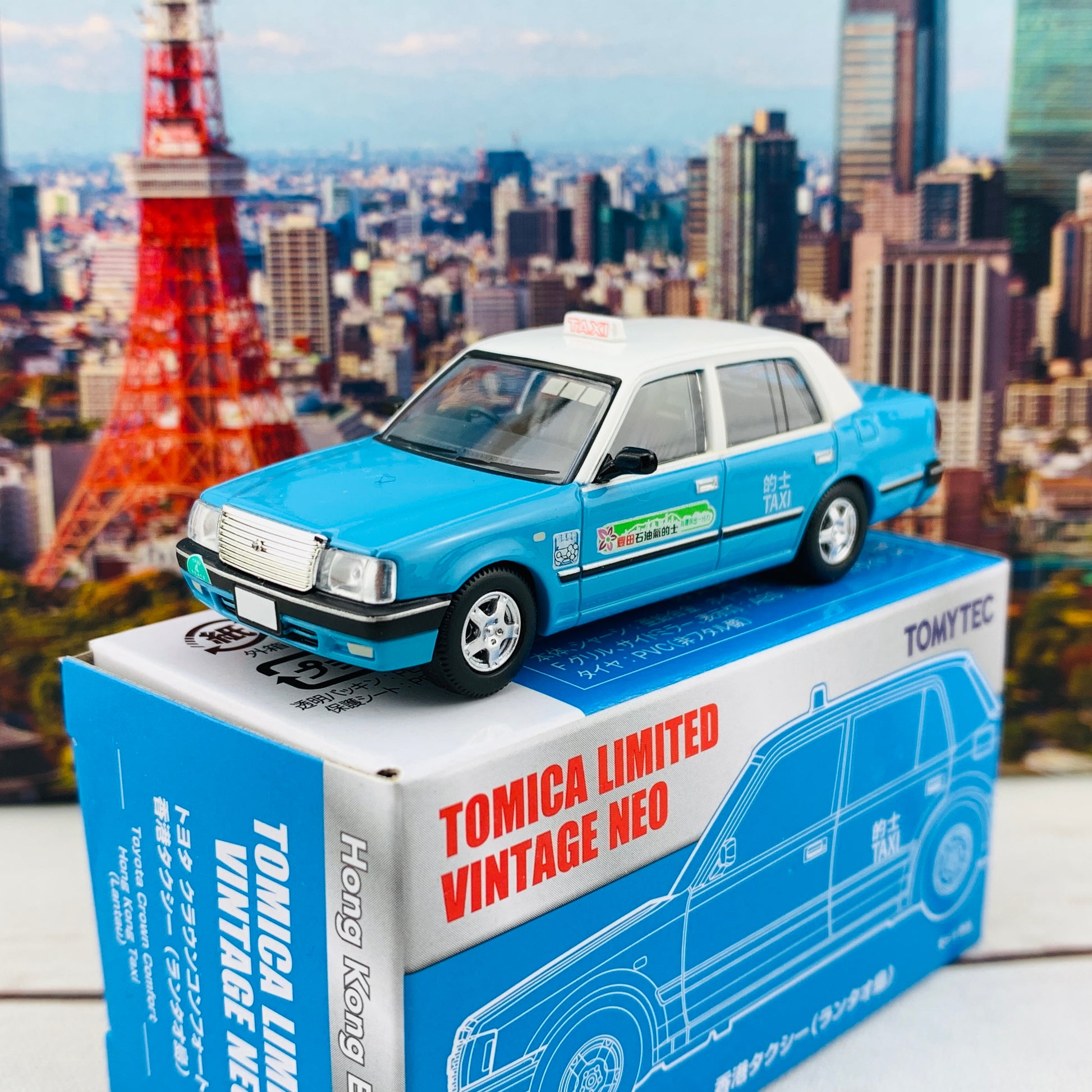 Tomytec Tomica Limited Vintage Neo 1/64 TOYOTA CROWN COMFORT HK TAXI LANTAU BLUE Hong Kong Exclusive
