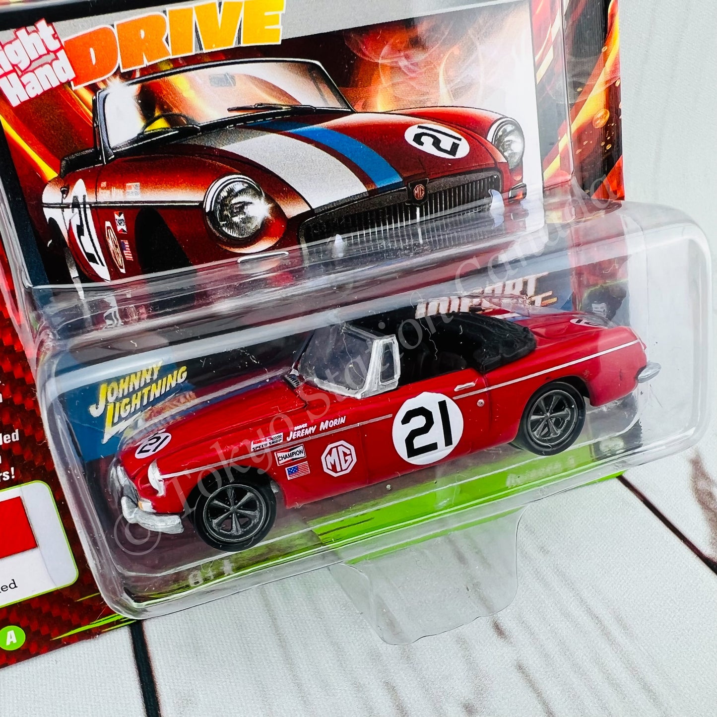 JOHNNY LIGHTNING 1/64 IMPORT HEAT 1963 MG MGB Bright Racing Red 849398049679